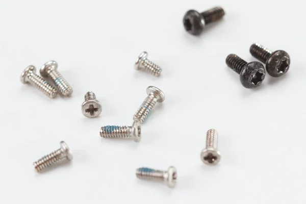 Close up metal screws on white background. — Stock Photo, Image