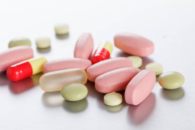 Hapları. Tablet. Kapsül: arka plan.