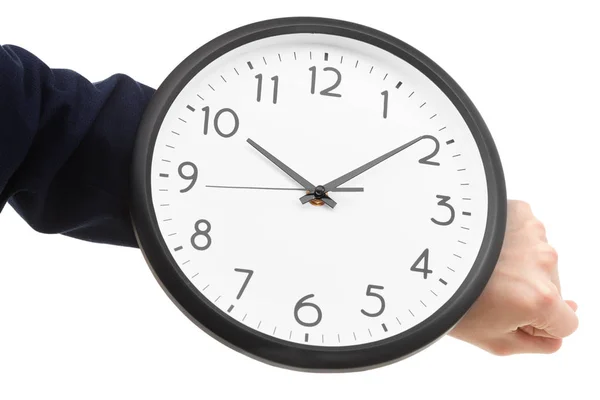 Geschäftsmann Hand hält Wanduhr, Zeitmanagement — Stockfoto