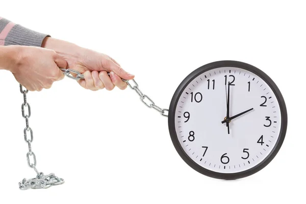 Hand holding an alarm wall clock, time management concept — Stock Photo, Image