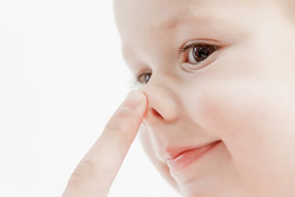 Tender lips and nose and finger of a child wake up, closeup — Stock Photo, Image