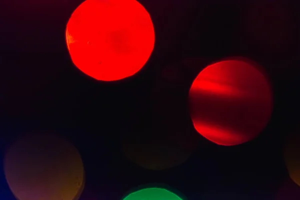 Bokeh osvětluje pozadí. Abstraktní mnohobarevné světlo. Vánoční koncept. — Stock fotografie
