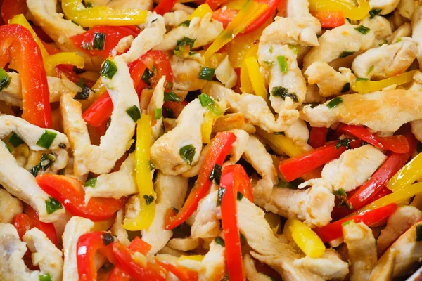 Pan with roasted vegetables and chicken for burritos close-up of cooking burrito. — Stock Photo, Image