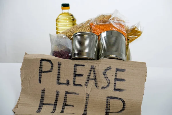 Alimentos en caja de plástico de donación, aislados sobre fondo blanco — Foto de Stock