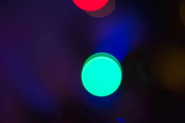 Bokeh luzes de fundo. Luz multicolorida abstrata. Conceito de Natal. — Fotografia de Stock