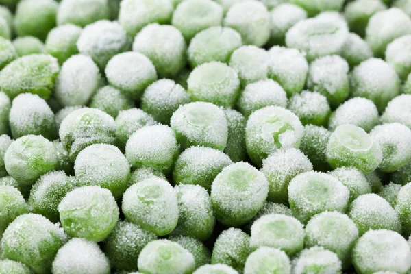 Овощной замороженный горох пищевой фон, здоровое натуральное питание . — стоковое фото
