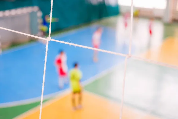Fußball defokussierte Spieler auf dem Feld, Futsal-Ball Feld in der Sporthalle Halle, Fußball-Sportplatz — Stockfoto