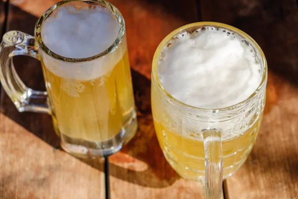 Close Two Cold Beers Foam Water Drops Old Wooden Table — Stock Photo, Image