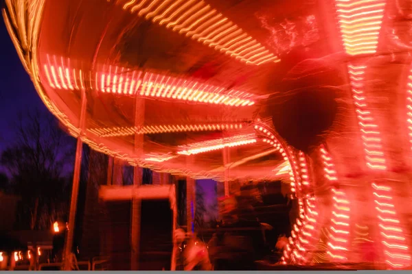 Beautiful bright carousel in amusement park,night — Stock Photo, Image