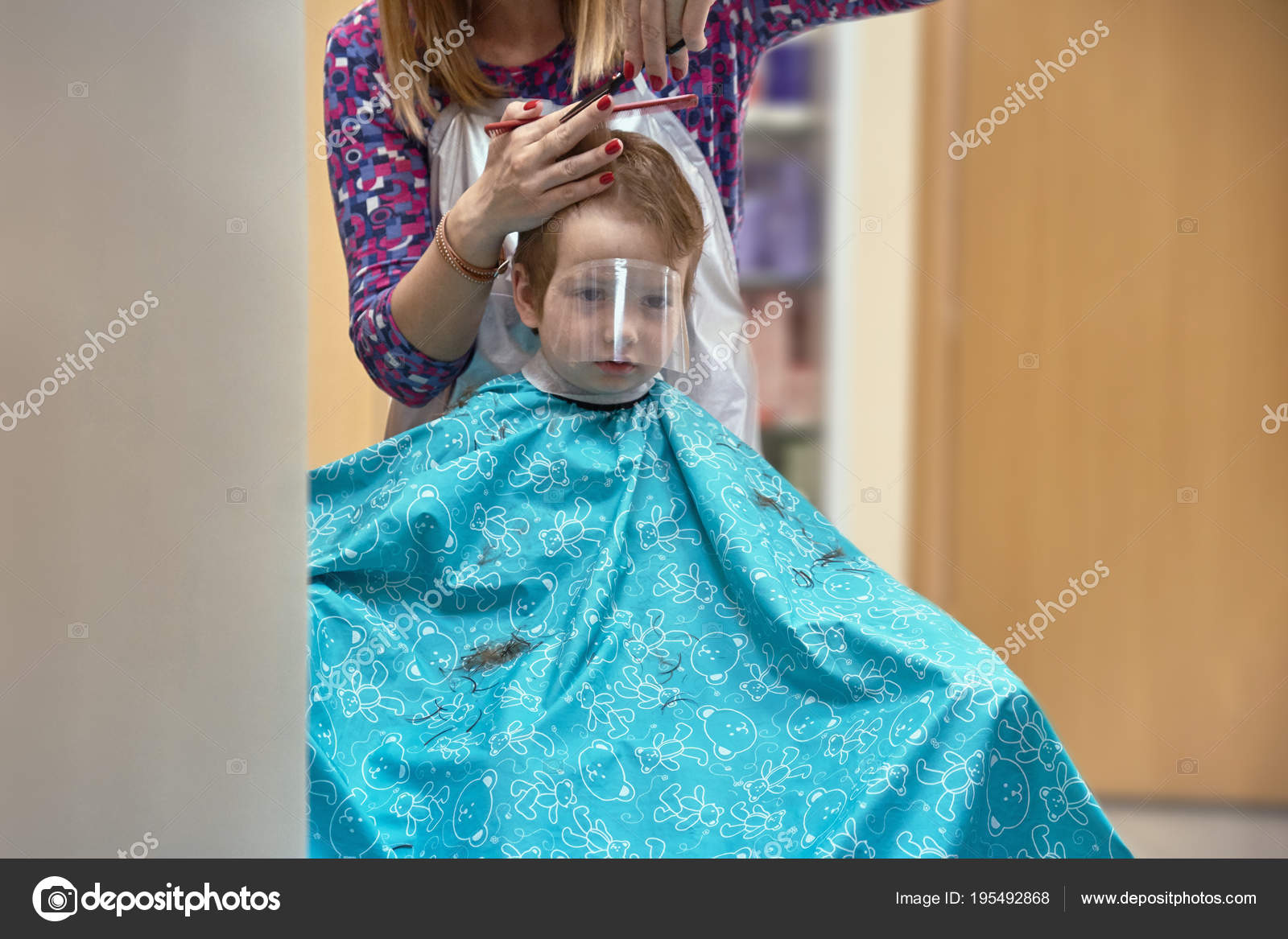 Cute Little Boy Having Hair Cut Stock Photo C Bravissimos 195492868