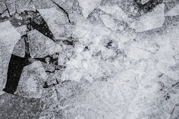 Broken and refrozen ice on water in top view — Stock Photo, Image