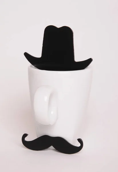 Kaffekopp i mans bild. Hipster stil, mustasch, hatt — Stockfoto