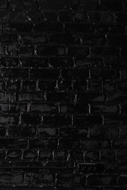 Siyah tuğladan bir duvar dokusu