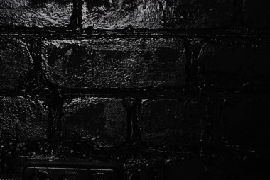 Siyah tuğladan bir duvar dokusu