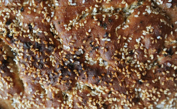 Textura de pan recién horneado con semillas de sésamo —  Fotos de Stock