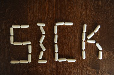 Hasta kelime hap kapsül ahşap zemin ile dışarı atılır