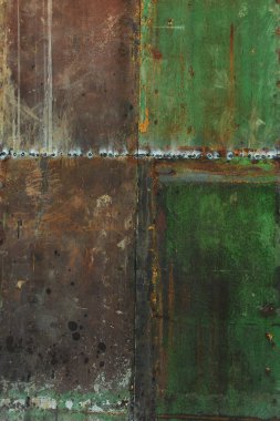 Çizikler ve çatlaklar ile yeşil metal doku