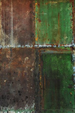 Çizikler ve çatlaklar ile yeşil metal doku