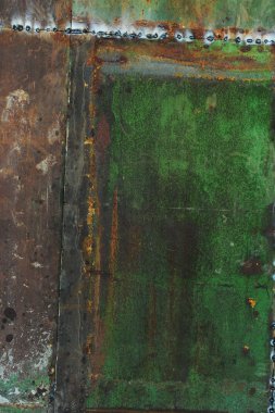 Çizikler ve çatlaklar ile yeşil metal doku