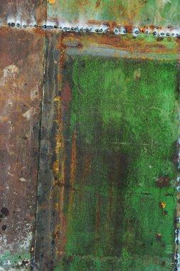 Çizikler ve çatlaklar ile yeşil metal doku