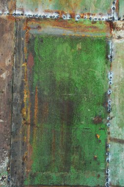 Çizikler ve çatlaklar ile yeşil metal doku