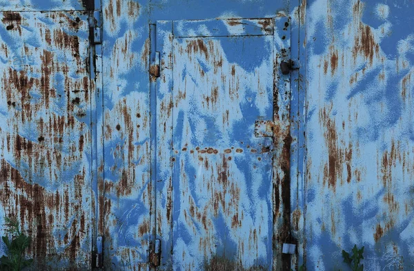 Çizikler ve çatlaklar ile mavi metal doku