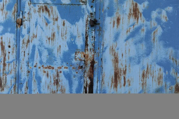 Blaue Metallstruktur mit Kratzern und Rissen — Stockfoto