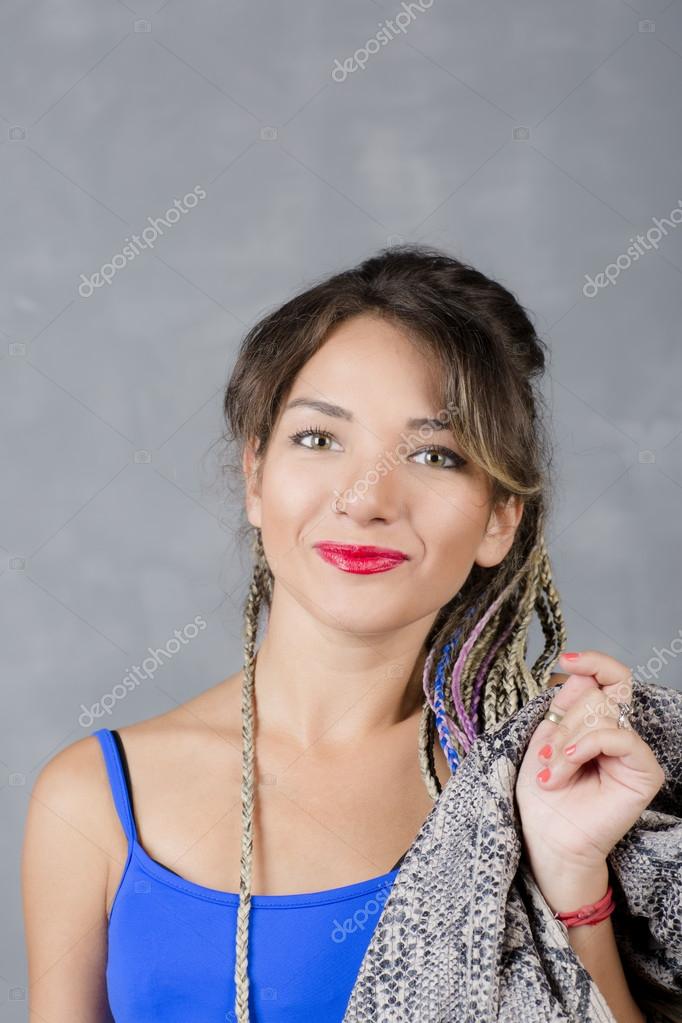 Woman Portrait With Colorful Dreadlocks Is A Studio Hippie