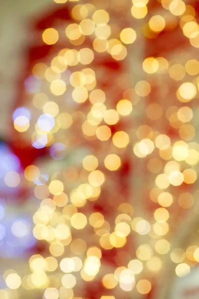 Kerstmis achtergrond met mooie gekleurde bokeh. — Stockfoto