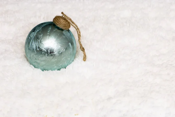 Christmas toy is on the light carpet. — Stock Photo, Image