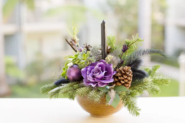 Bouquet has Christmas tree branches and artificial flowers. — Stock Photo, Image