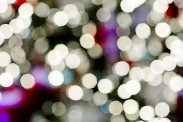 Kerstmis achtergrond heeft mooie gekleurde bokeh. — Stockfoto