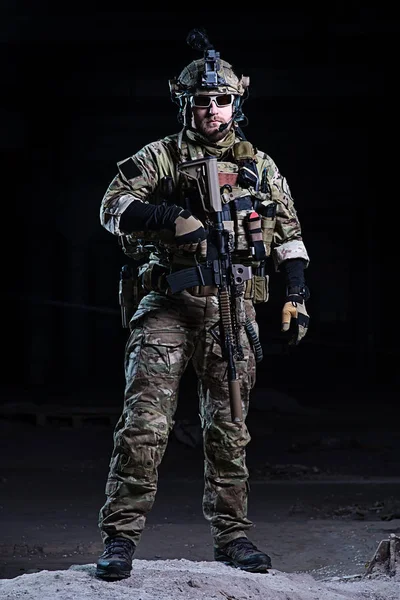 Special forces soldier with rifle on dark background — Stock Photo, Image