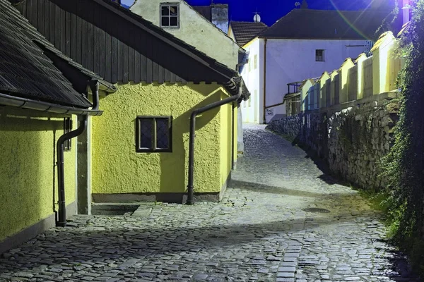 Medieval street in old town of Cesky Krumlov, evening view. Czech Republic