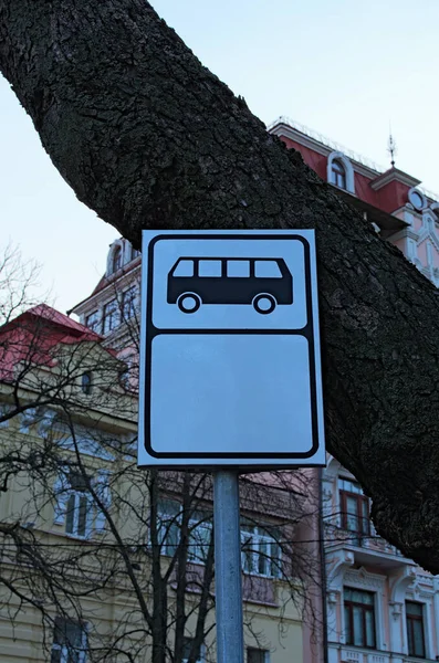 Bus stop sign. Public transport. Black and white bus stop sign. Cityscape background. Kyiv, Ukraine.