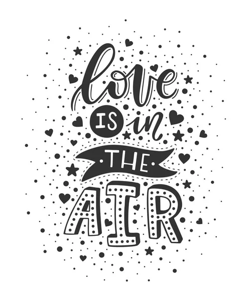 Kézzel betűkkel a szeretet van a levegőben. Valentin-nap — Stock Vector