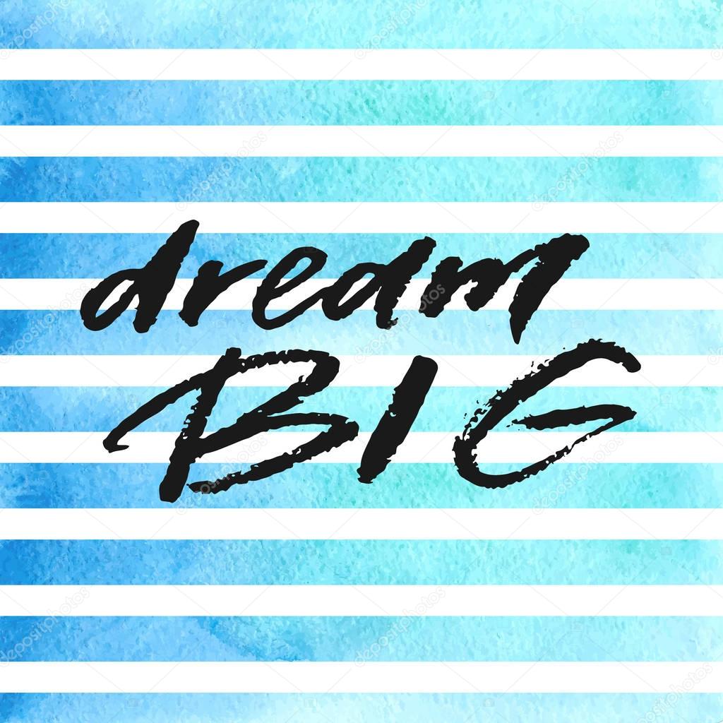 Dream big hand drawn lettering on blue watercolor stripes
