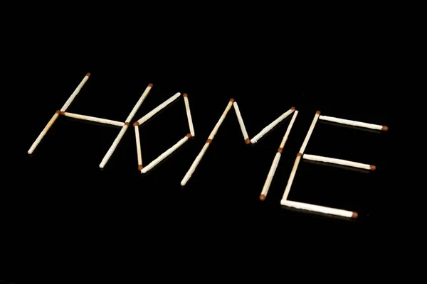 The inscription of matches: home. — Stock Photo, Image