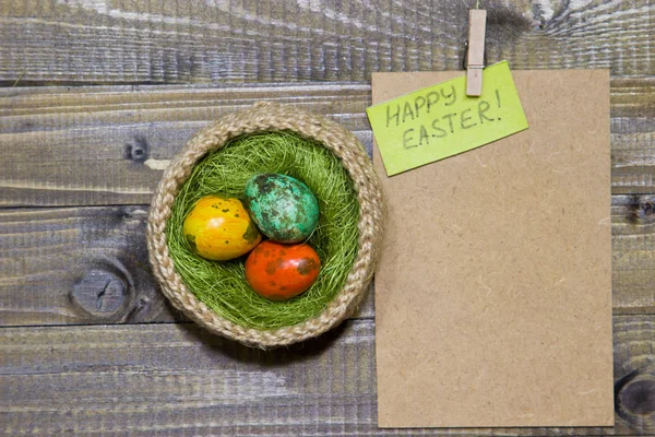 Easter eggs in a basket. Painted Quail eggs. — Stock Photo, Image
