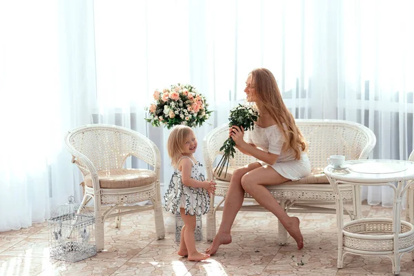 Little Daughter Congratulates Her Mother Holiday Sunny Light — Stock Photo, Image