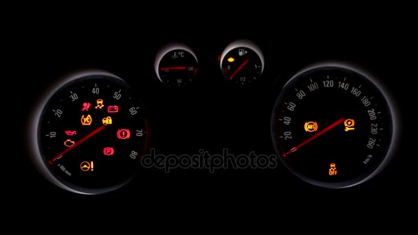 Car dashboard over a black background — Stock Video