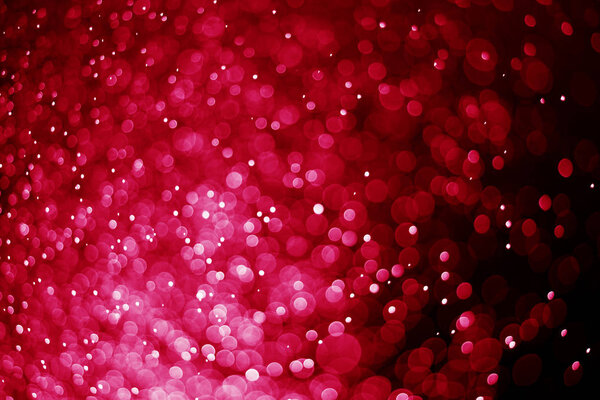 Glitter light red bokeh blurred