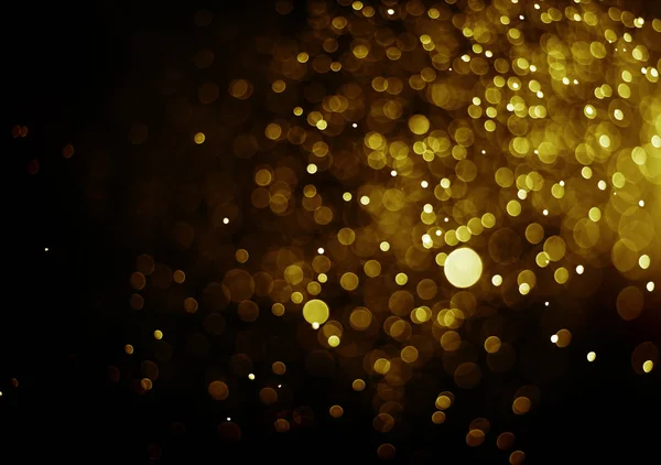 ライトゴールド カラー黒背景のボケ味 — ストック写真