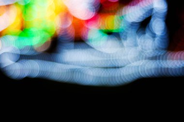 Bokeh Noel ışık gece soyut siyah arka plan üzerine 