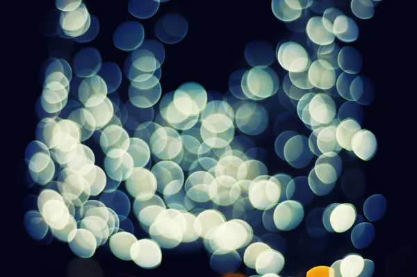 黒の背景ボケ クリスマス光夜抽象 — ストック写真