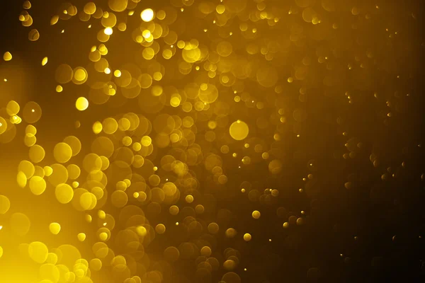 Bokeh Licht Gold Farbe schwarzer Hintergrund — Stockfoto