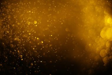 Bokeh ışık altın rengi siyah arka plan 