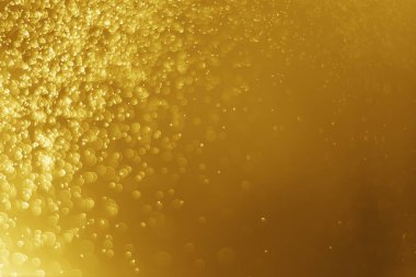 Parlak ışık soyut altın bokeh bulanık Noel arka plan 