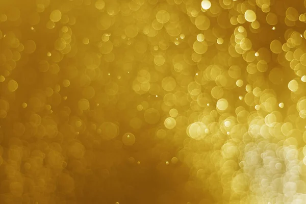 Brilho luz bokeh ouro natal fundo borrado — Fotografia de Stock