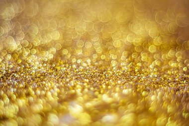 Glitter ışık soyut altın bokeh bulanık arka plan 